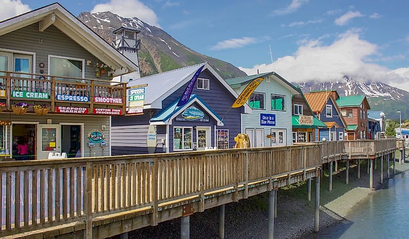 Shops along the dock in Seward Harbor in Resurrection Bay in Seward, Alaska