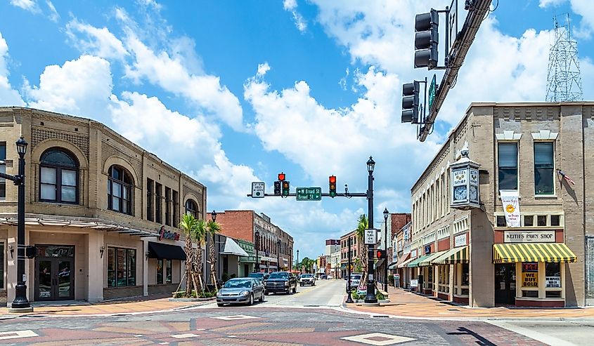 Main street in historic Lake Charles old town in Midday sun.