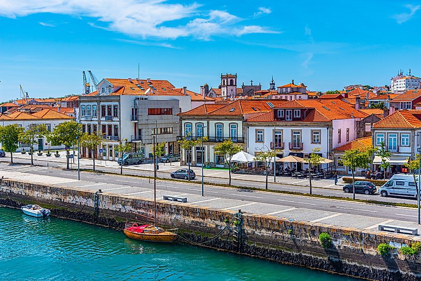 Colorful facades of houses on Lima riverside in Viana do Castelo in Portugal.