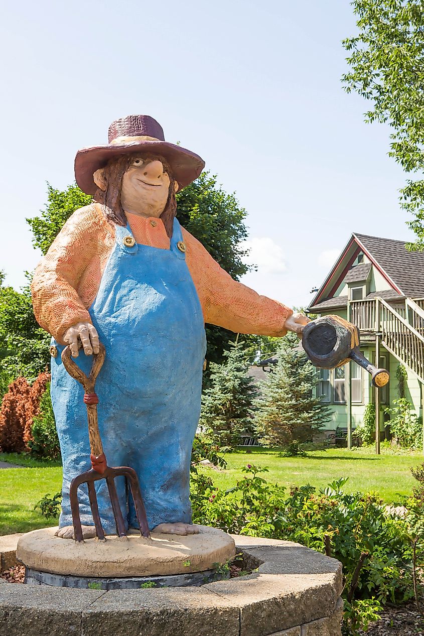 A gardner troll stands alongside the Main Street at Mount Horeb, Wisoconsin