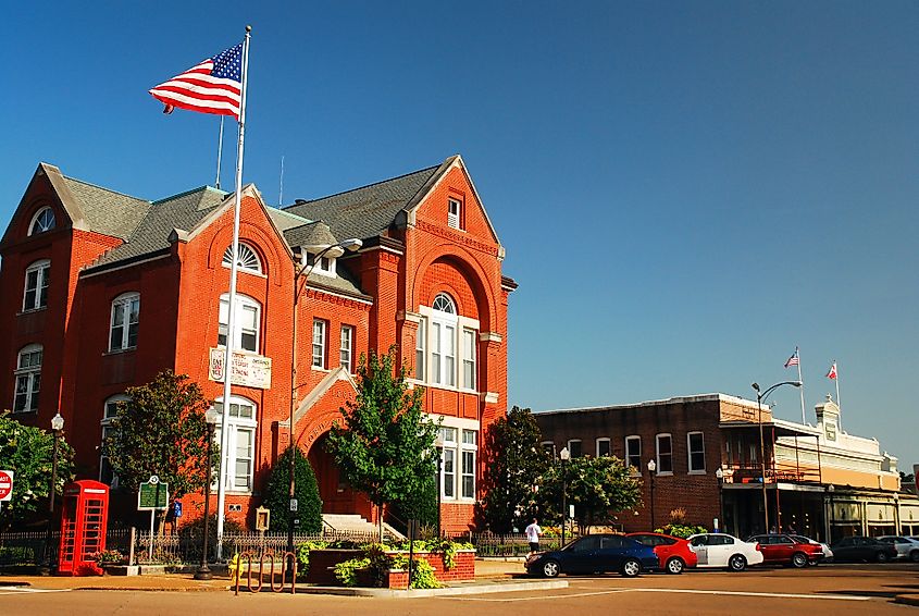 An American flag waves above the City Hall of Oxford, Mississippi.