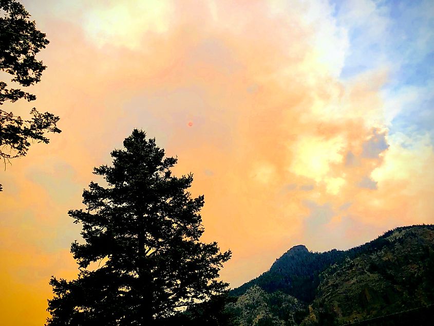 Fishhawk Fire Smoke Above Green Creek and the Red Sun at Shoshone National Forest.