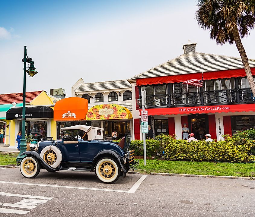 Vintage cars by elegant stores in Sarasota, Florida
