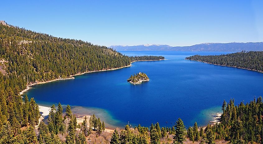 Emerald Bay in Lake Tahoe, California, with its clear turquoise waters nestled among mountain landscapes.