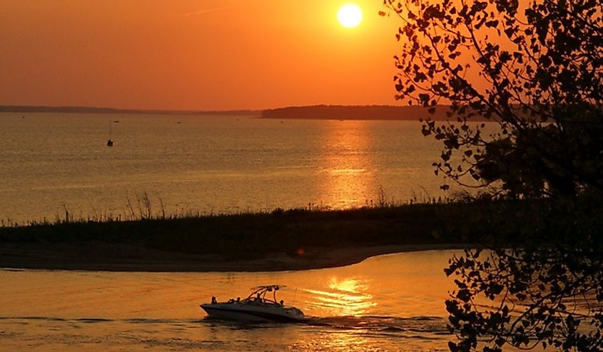Boaters enjoying a sunset cruise on Rathbun Lake near Centerville, Iowa.