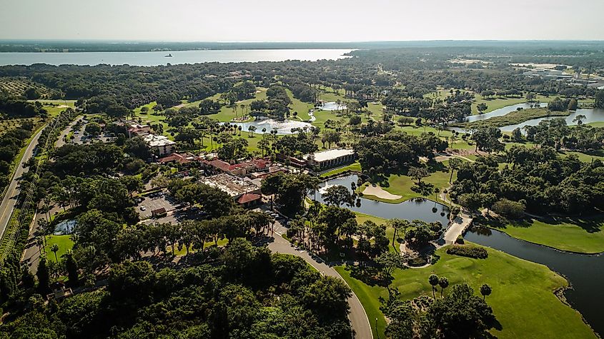Aerial view of Mission Inn Resort & Club with Little Lake Harris far in the background. 