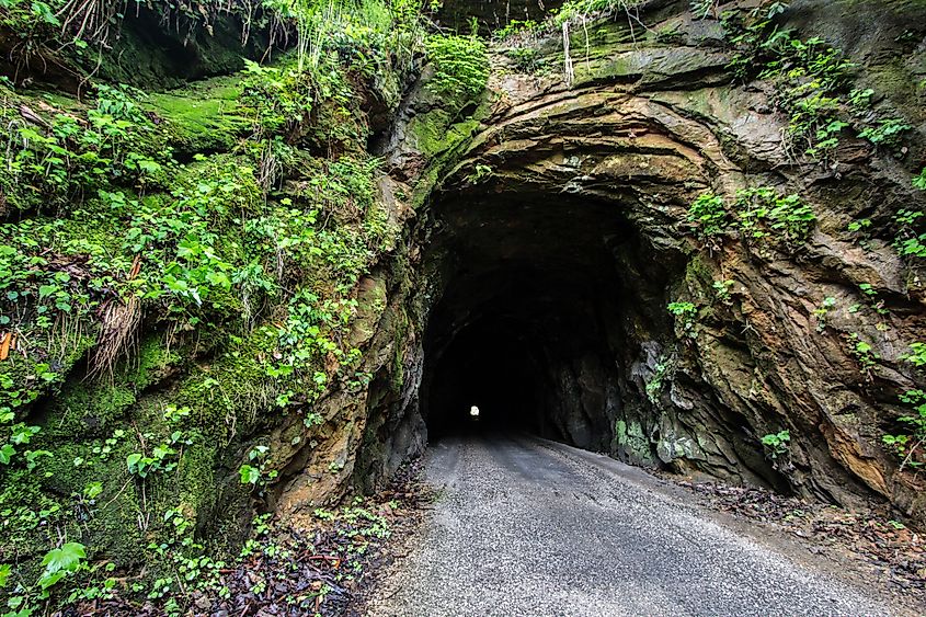 The 900 foot Nada Tunnel in the Red River Gorge of Kentucky. Open to traffic, the harrowing one way tunnel is a thoroughfare for a two way traffic. 