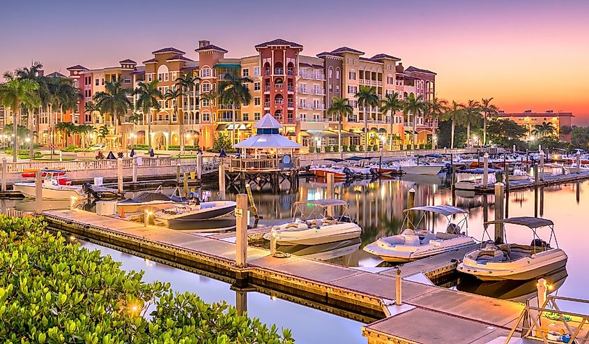 Naples, Florida, town skyline on the water at dawn.