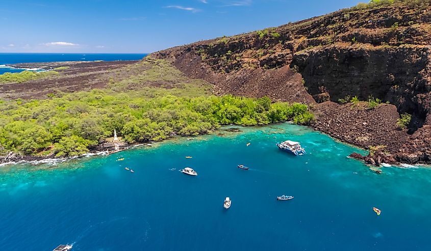 Aerial drone view the Captain James Cook Monument in Kealakekua Bay, Big Island, Hawaii.