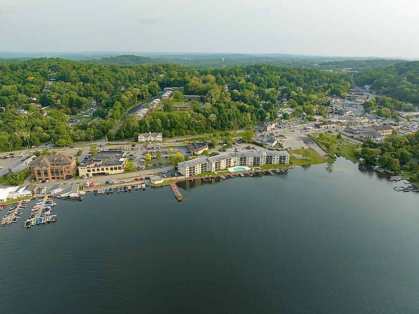 Late afternoon aerial photo of Lake Mahopac located in Town of Carmel, Putnam County, New York.