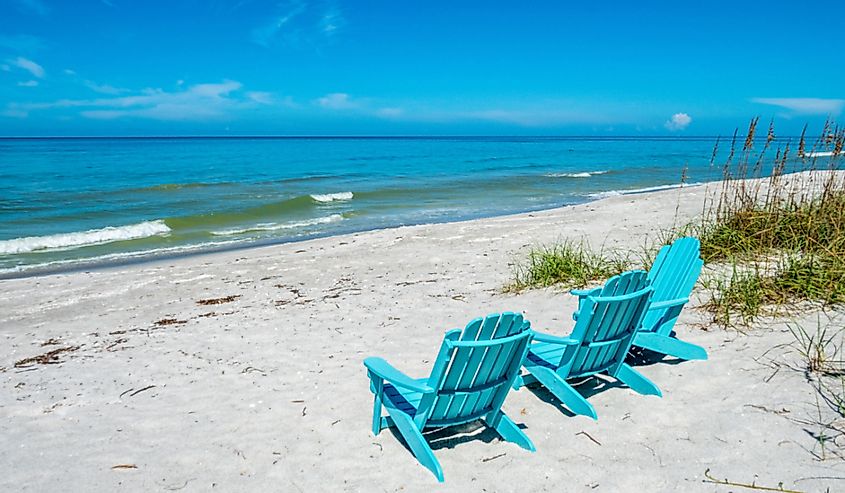 Beach chairs on Gulf of Mexico beach on Longboat Key, Florida.