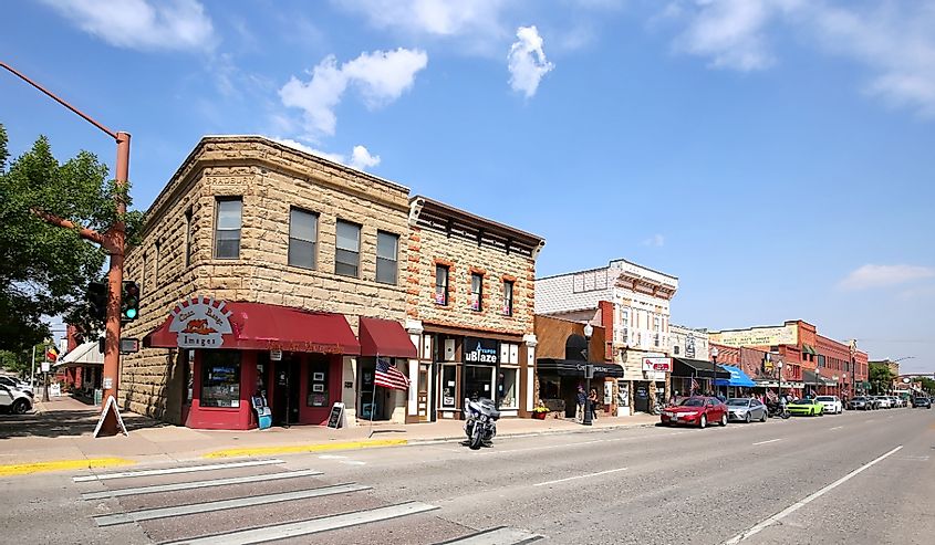 Downtown street in Cody, with wide streets historic buildings.