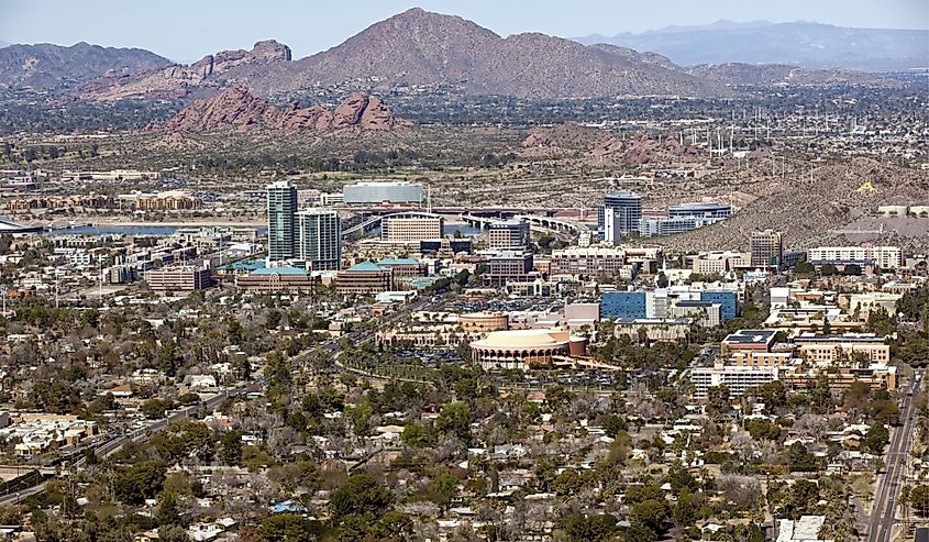 Skyline of downtown Tempe, Arizona with the Papago Buttes and Camelback Mountain in the distance