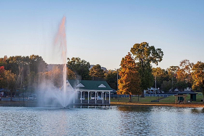 Fountain and gazebo in late afternoon at Oxford Lake Park, Oxford, Alabama, USA.