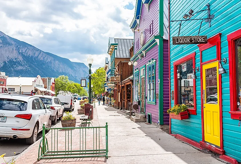 Colorful village houses and downtown street in summer in Crested Butte, Colorado. Image credit Kristi Blokhin via Shutterstock
