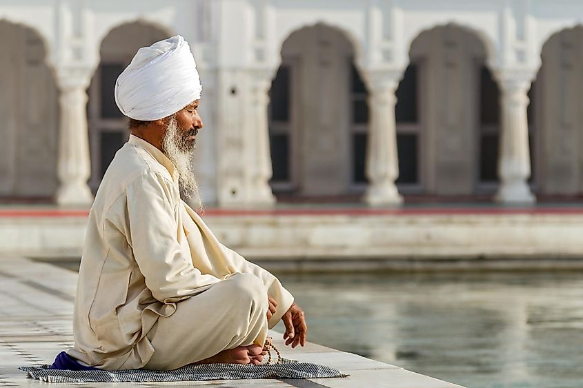 Sikh in a obliteration prayer In the lotus position