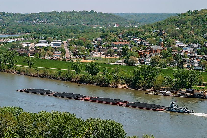 A Coal Barge On The Ohio River At Bellevue And Dayton Kentucky Across From Cincinnati Ohio USA. Paul D. Lemke via Shutterstock