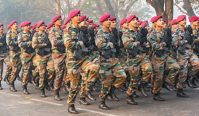 Indian armed force Officers are marching past with light machine guns, preparing for show for India's republic day celebration