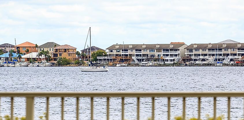 Boat Anchored on Choctawhatchee Bay: Boat anchored on Choctawhatchee Bay in Ft. Walton Beach, Florida, via Mccallk69 / Shutterstock.com