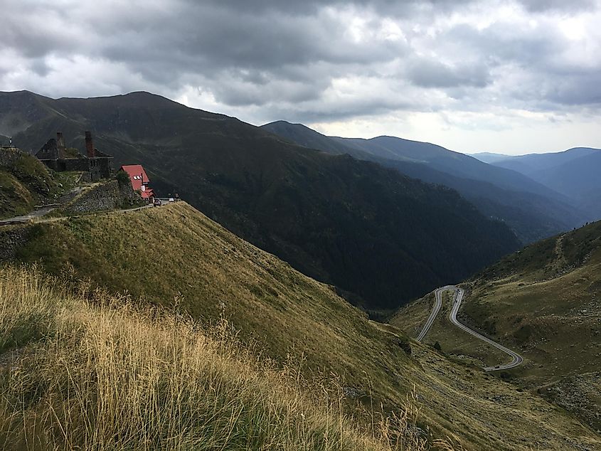 A moody day on a winding mountain highway in Transylvania. 