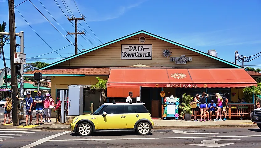 Paia, a cute town with restaurants and art galleries and the last stop on the Road to Hana on the North Shore of Maui, is often called the World Capital of Windsurfing, via EQRoy / Shutterstock.com