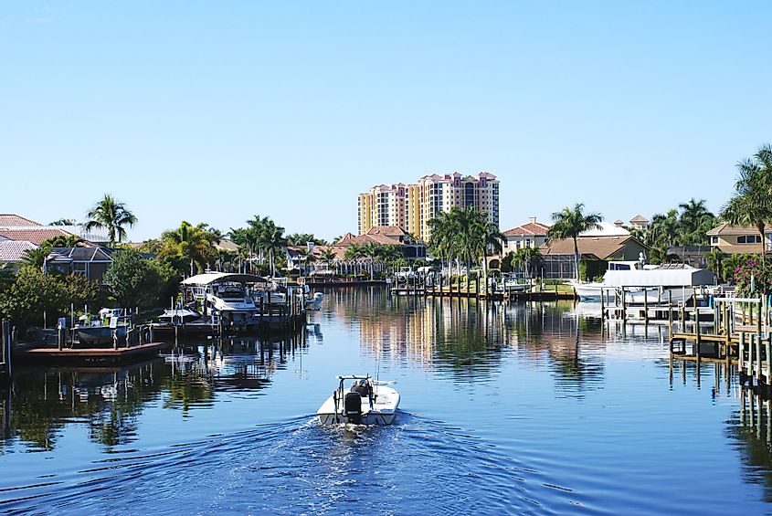Boating along a canal in Cape Coral, Florida