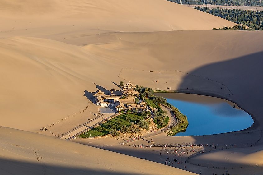 Crescent Moon Lake at Singing Sands Dune near Dunhuang, Gansu Province, China.