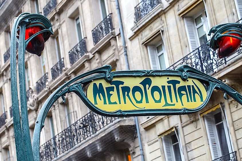 An Art Nouveau Metropolitain sign above a Paris Métro entrance in France.