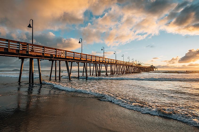 The pier and Pacific Ocean at sunset, in Imperial Beach, in San Diego, California