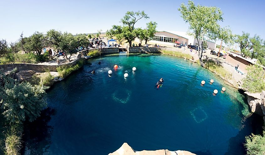 At 80 feet deep with clear blue water, the Blue Hole on Route 66 in Santa Rosa, NM, attracts divers and others. View from above