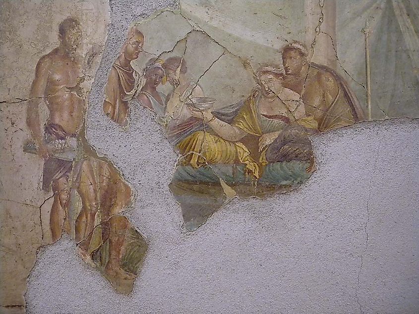 A Roman painting from the House of Giuseppe II in Pompeii, early 1st century AD, most likely depicting Cleopatra, wearing her royal diadem and consuming poison in an act of suicide