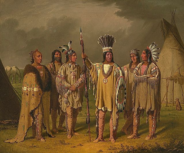 Six Blackfeet Chiefs painted by Paul Kane along the North Saskatchewan River in Saskatchewan Canada. "Amongst others, I sketched group No. 17, consisting of Big Snake, the centre figure; Mis-ke-me-kin, “The Iron Collar,” a Blood Indian chief, with his face painted red; to the extreme left of the picture, is a chief called “Little Horn,” with a buffalo robe draped round him, and between him and Big Snake is Wah-nis-stow, “The White Buffalo,” principal chief of the Sur-cee tribe. In the background stand two chiefs of inferior quality, one of them has his face painted half black, being in half-mourning for some friend." (Paul Kane, "Wanderings of an Artist," 1859:424-425)