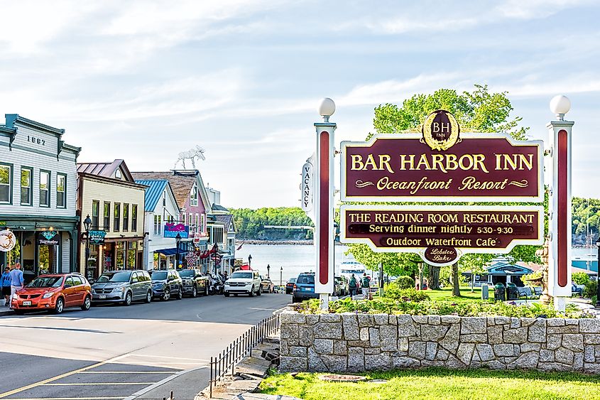 Oceanfront resort inn sign with waterfront dining and harbor in downtown Bar Harbor, via Andriy Blokhin / Shutterstock.com