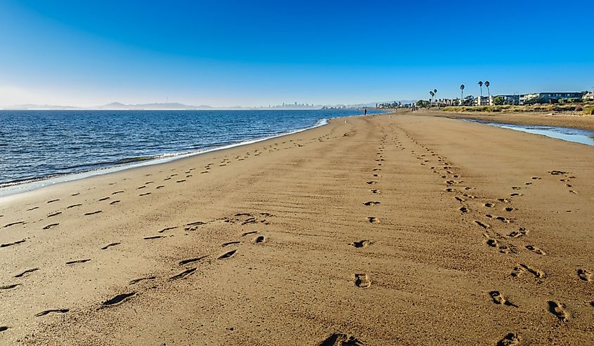 Crown Memorial State Beach in Alameda, California. Can see footprints in the sand. 