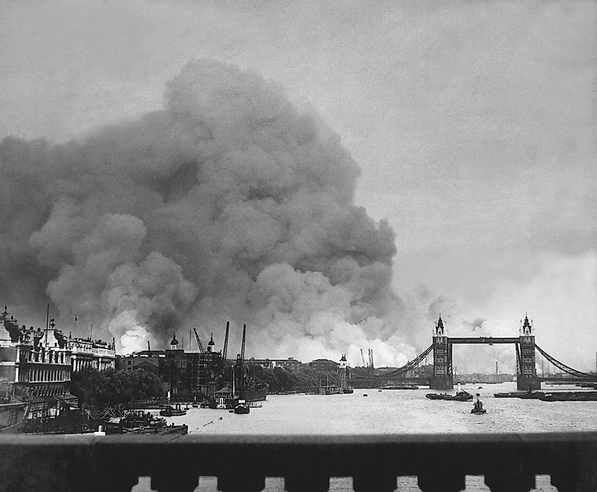 The first mass German air raid on London, during World War 2. Tower Bridge stands out against a background of smoke and fires. Sept. 7, 1940