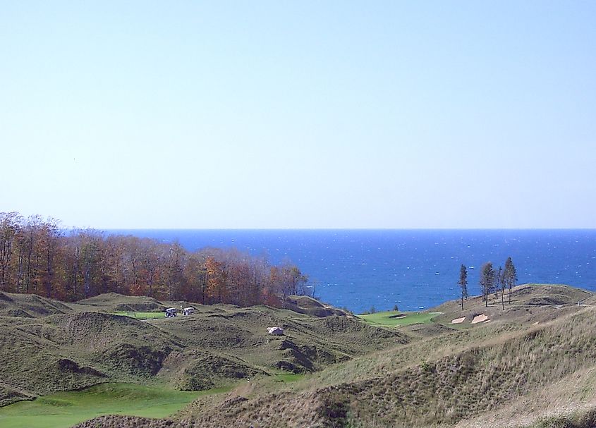Picture of Arcadia Bluffs Golf Course in Arcadia, Michigan. Photo was taken from the clubhouse and overlooks the 10th and 11th holes, as well as Lake Michigan.