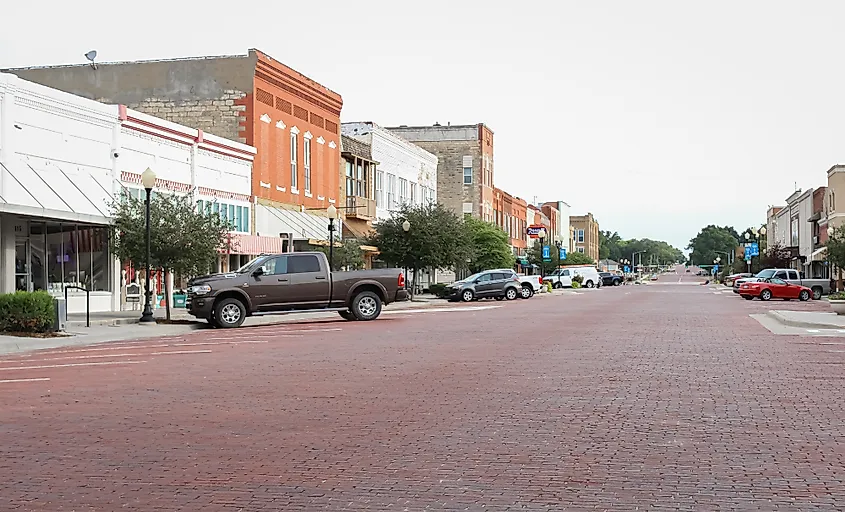 Augusta, Kansas United States - August 16 2021: a view of the main street in the morning with a truck parked in front of a store