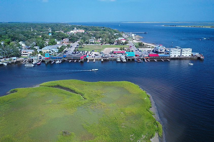 Looking at the resturants at Southport. The colorful roofs line the shore for the boats to dock at.