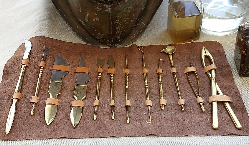 Various ancient Roman scalpels and other surgical instruments made from brass and steel
