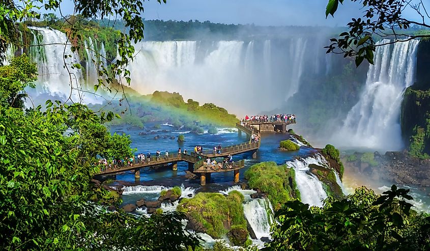 Tourists at Iguazu Falls, one of the world's great natural wonders, on the border of Brazil and Argentina.