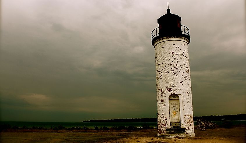 Very dramatic shot of an old lighthouse on Beaver Island in Lake Michigan
