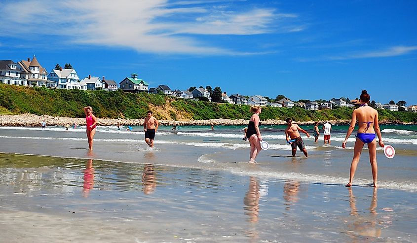 Folks enjoy playing summer games on Long Sands Beach in York, Maine