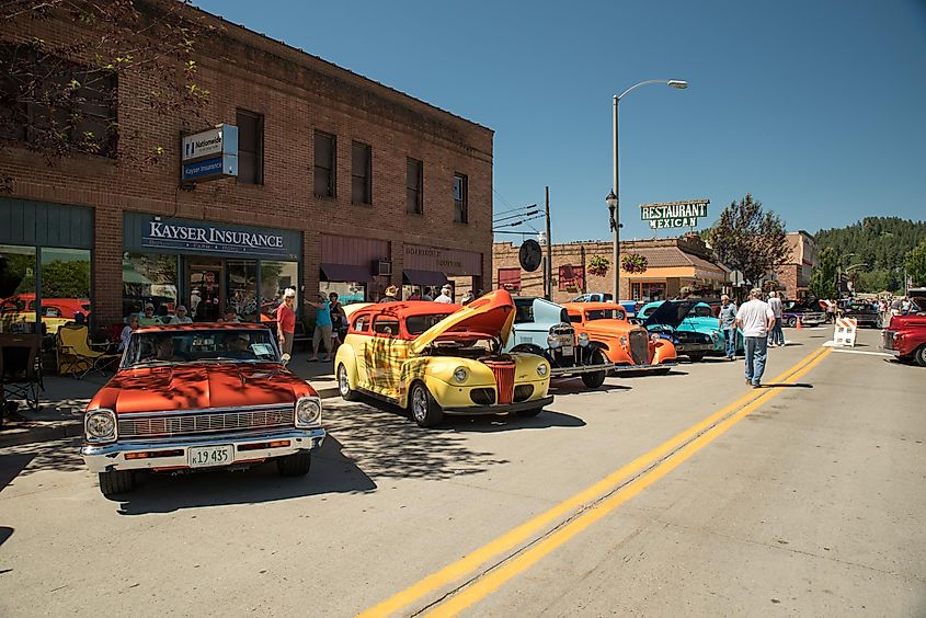 Spectators at the Rod Benders Car Club annual June show, the Borders 3 Jamboree in Bonners Ferry, Idaho, USA.