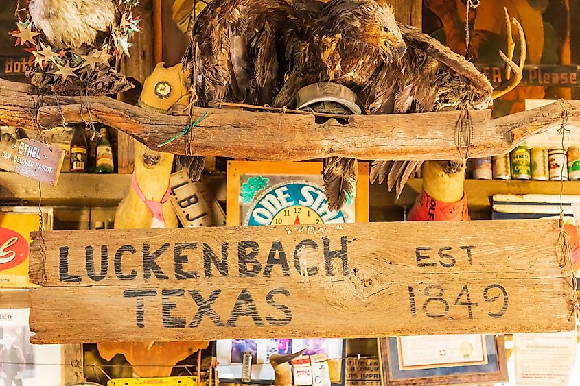 Sign on the wall of a saloon in Luckenbach, Texas.