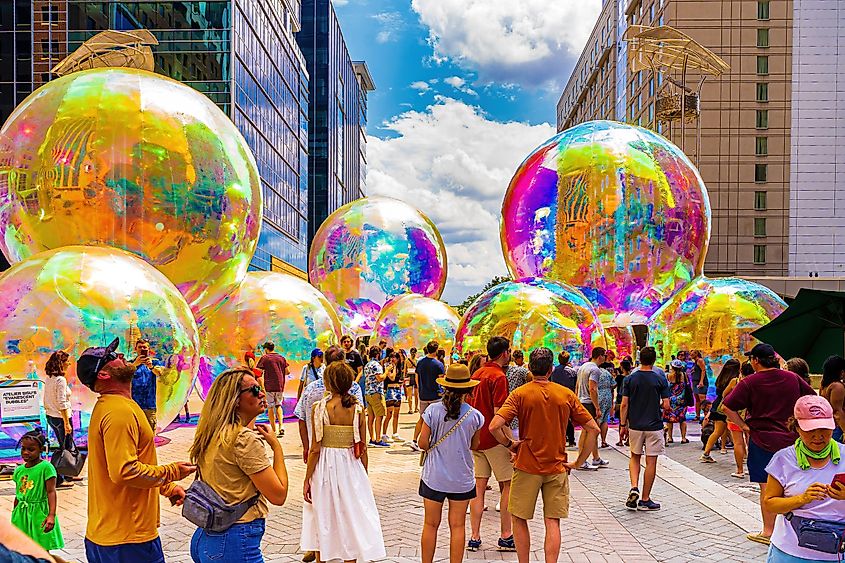 Evanescent Bubbles Fill the Street at Raleigh Artsplosure Art Festival.