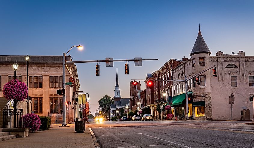 Scarce traffic on Main Street in downtown Woodford county's Versailles, KY during sunrise