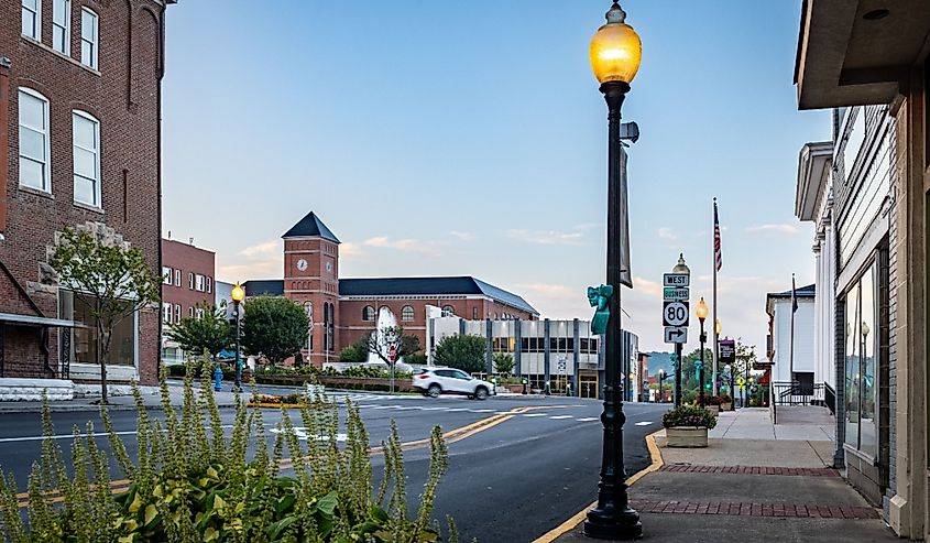 A car is turning on the roundabout around downtown fountain in a square in Somerset, Kentucky
