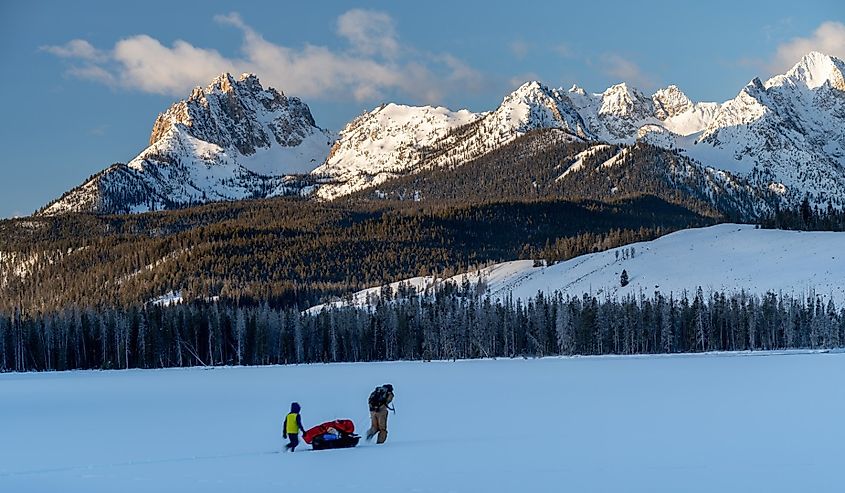 Man pulls sled at Stanley, Idaho.