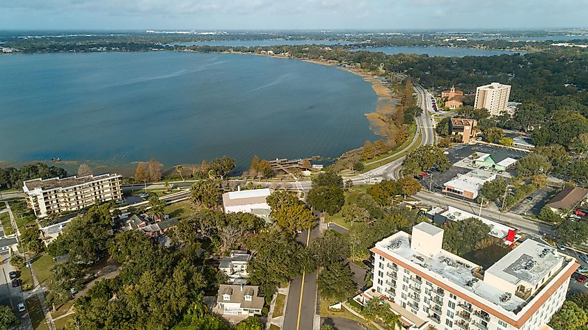 Winter Haven, FL / USA - 1/12/2020: Aerial drone shot of downtown Winter Haven, FL on a sunny day.