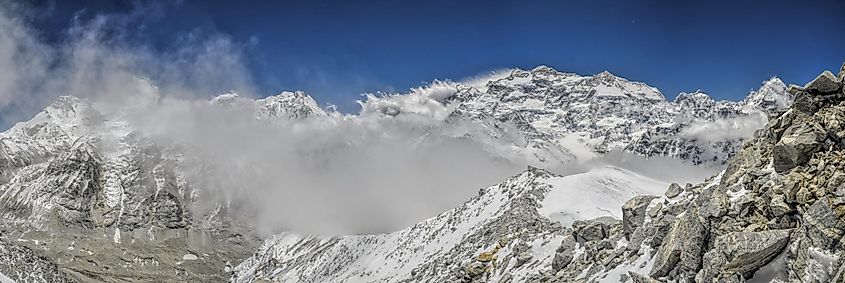 Kangchenjunga rising above the clouds in the Himalayas.